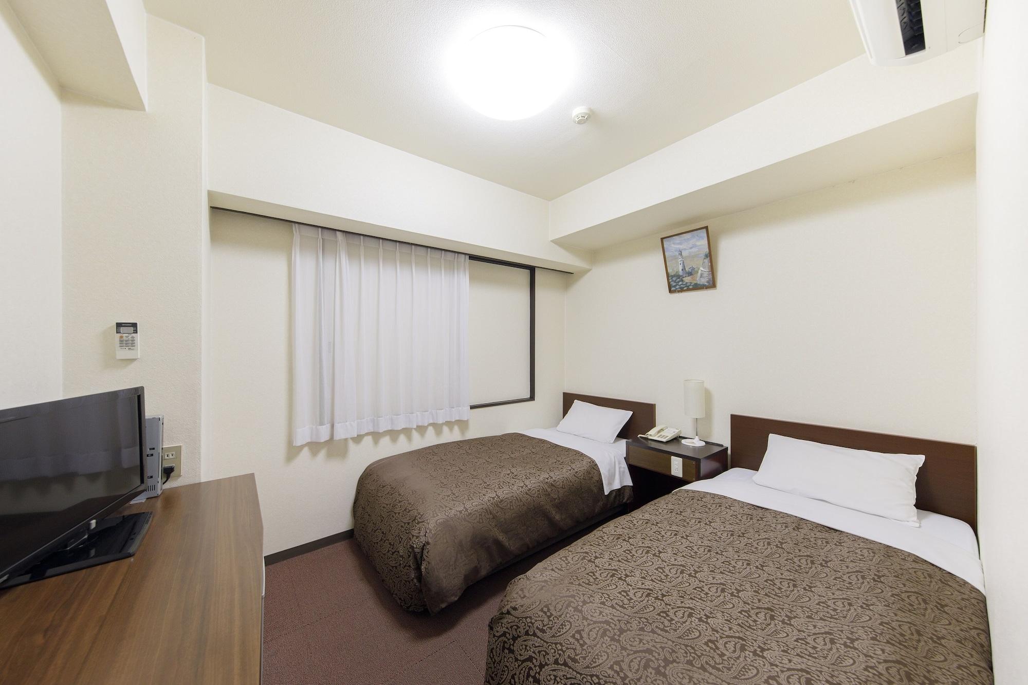 Dai-Ni Sunny Stone Hotel Suita Extérieur photo