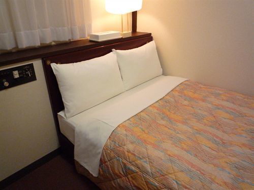 Dai-Ni Sunny Stone Hotel Suita Extérieur photo