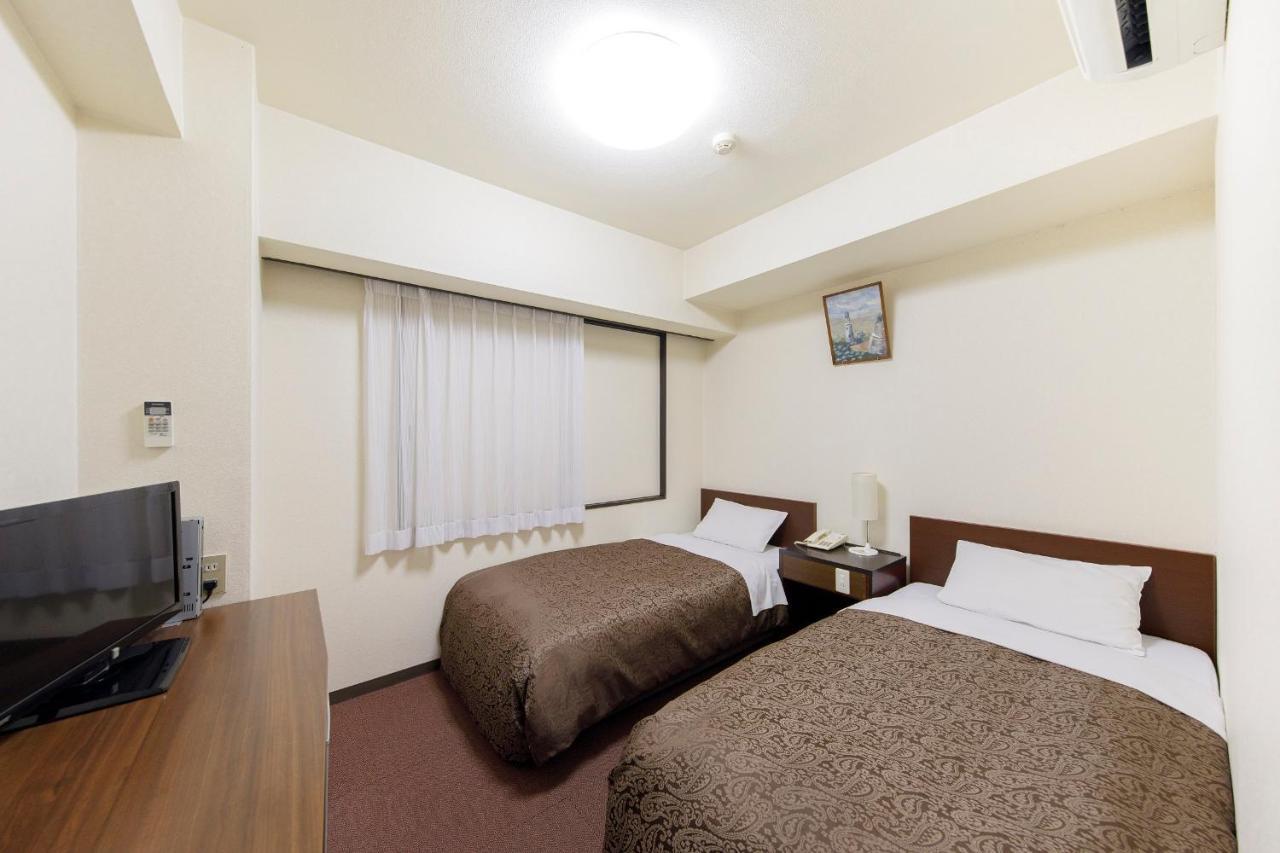 Dai-Ni Sunny Stone Hotel Suita Extérieur photo